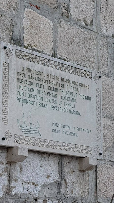 Memorial plaque with inscribed text